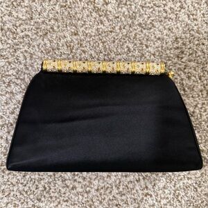Judith Leiber Chic Black Clutch with Bejeweled Gold Detailing